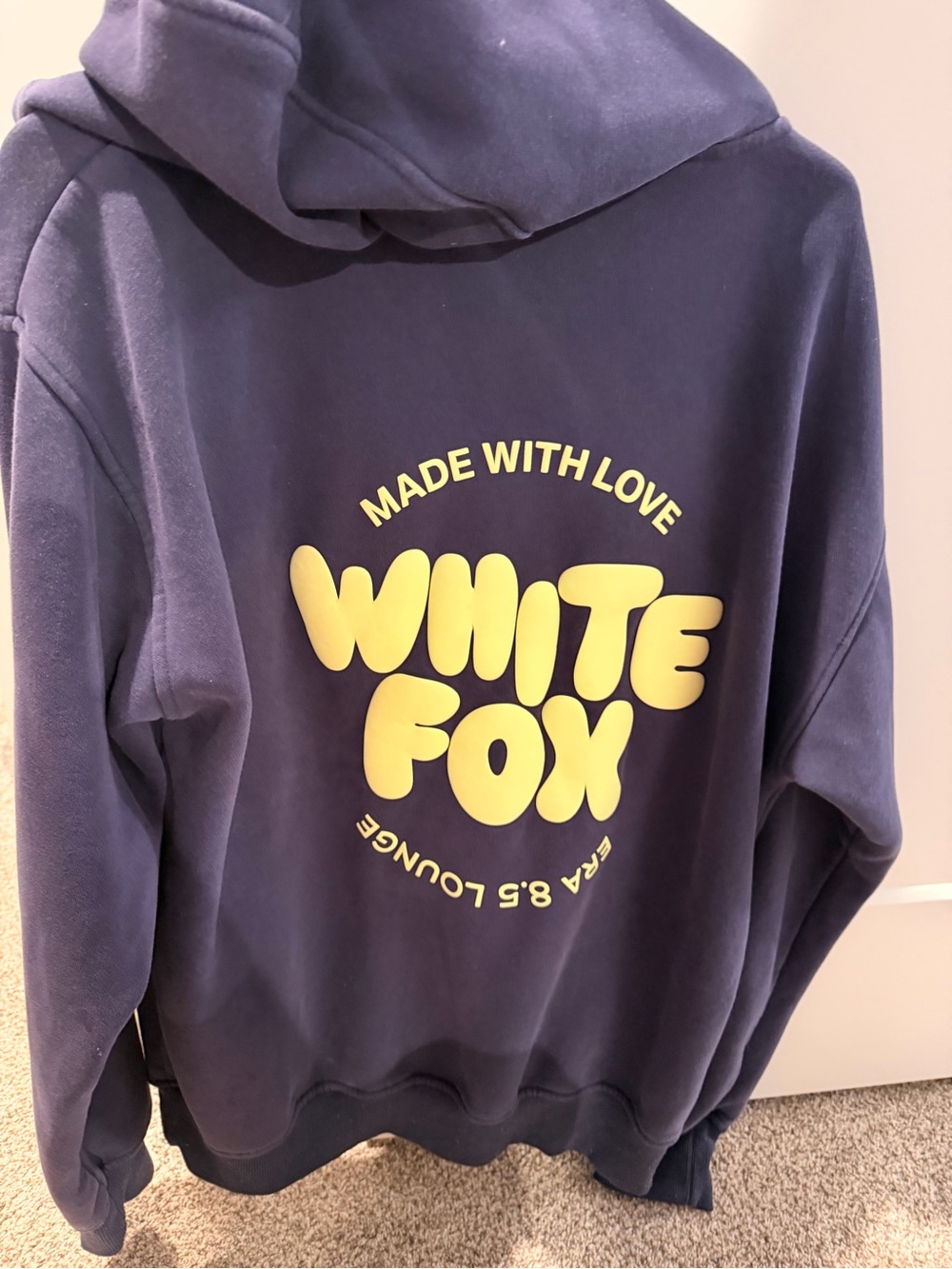 White Fox Boutique Navy Blue Hoodie with Cream/Yellow Logo